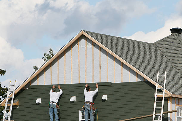 Professional Siding Contractor technician working in Norwich, NY